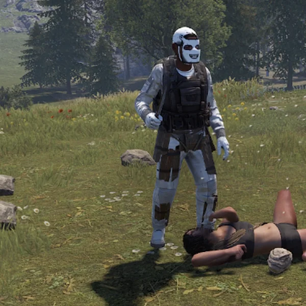 A player's corpse in the grass, moments before it rises